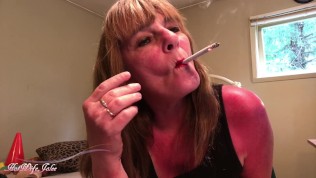 Sexy red mouth sultry smoking